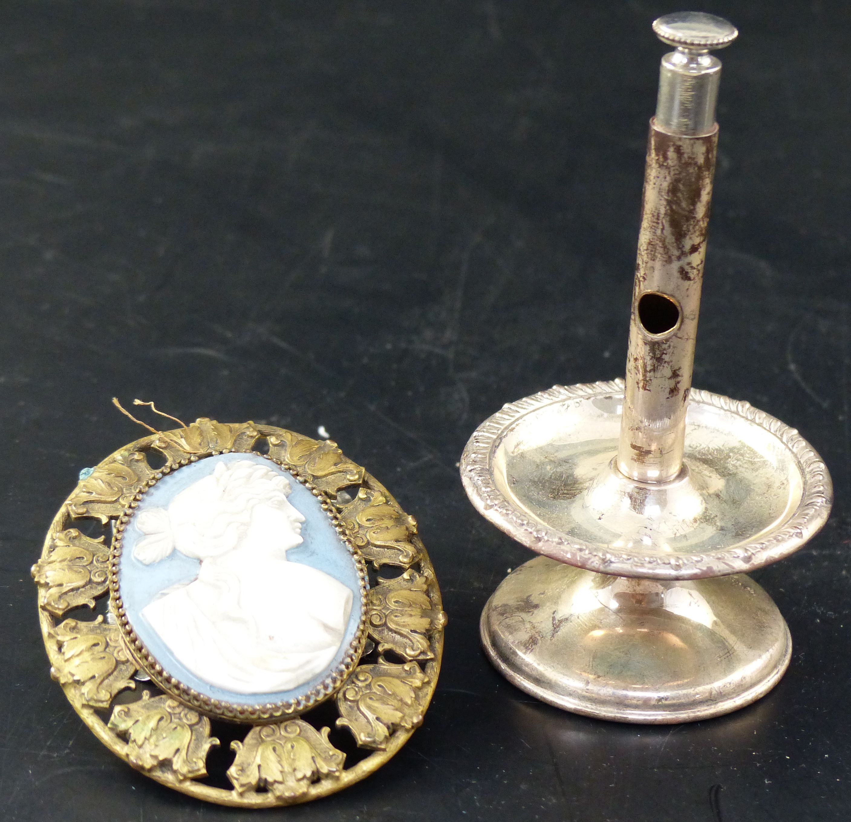 An Edwardian silver mounted vertical cigar cutter with dished stem, Chester, 1901, 10.5cm and a jasper cameo plaque
